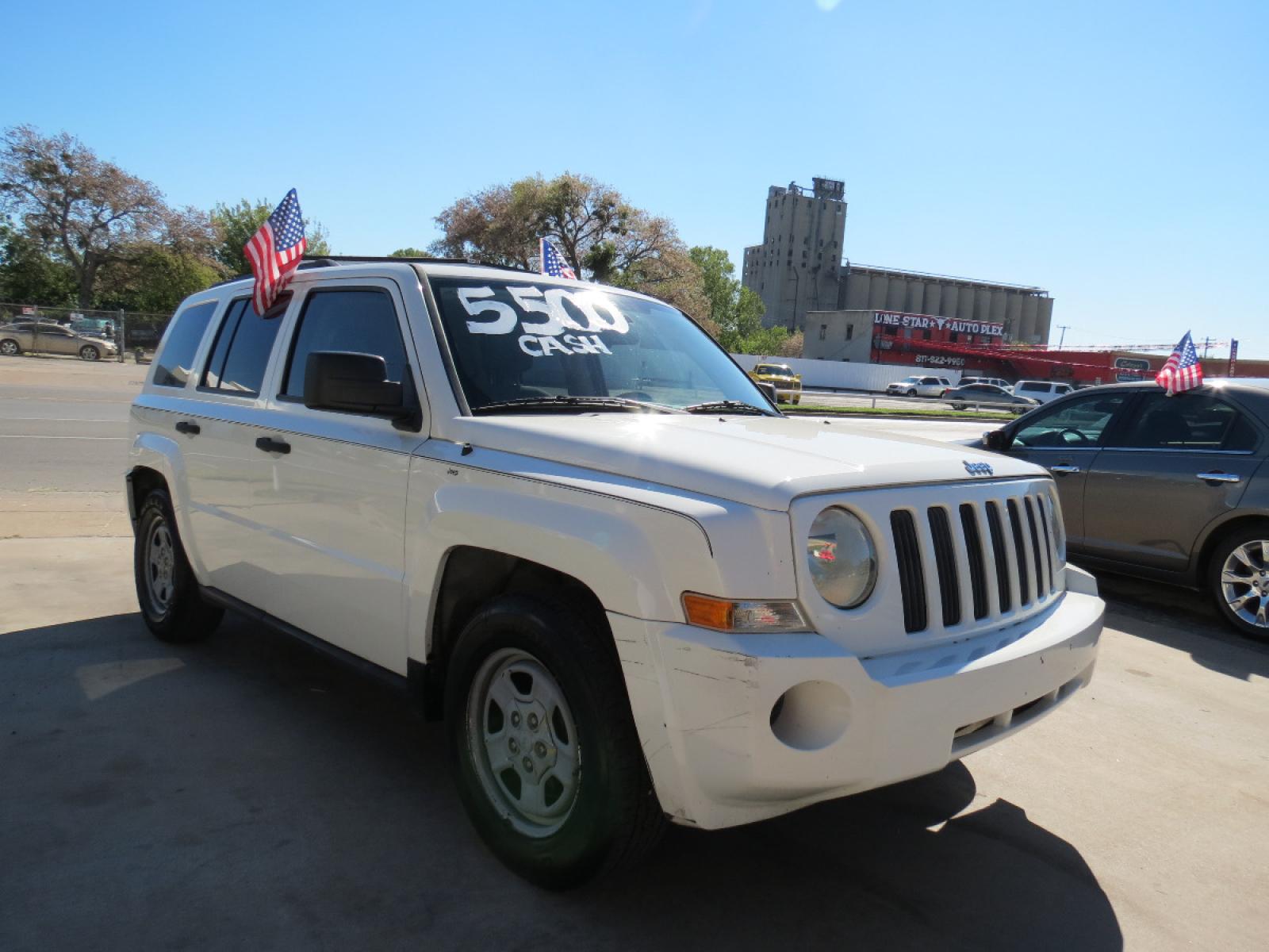 2007 White Jeep Patriot Sport 2WD (1J8FT28W77D) with an 2.4L L4 DOHC 16V engine, Automatic transmission, located at 3624 Hemphill St., Fort Worth, TX, 76110, (817) 926-8921, 32.696205, -97.331985 - Photo #5