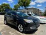 2014 Black Ford Escape SE FWD (1FMCU0GX7EU) with an 1.6L L4 DOHC 16V engine, Automatic transmission, located at 3624 Hemphill St., Fort Worth, TX, 76110, (817) 926-8921, 32.696205, -97.331985 - Photo#0
