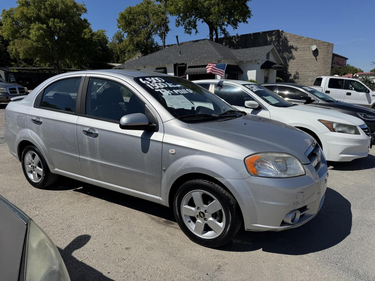 2008 Silver Chevrolet Aveo LT 4-Door (KL1TG56618B) with an 2.2L L4 DOHC 16V engine, Automatic transmission, located at 3624 Hemphill St., Fort Worth, TX, 76110, (817) 926-8921, 32.696205, -97.331985 - Photo#2
