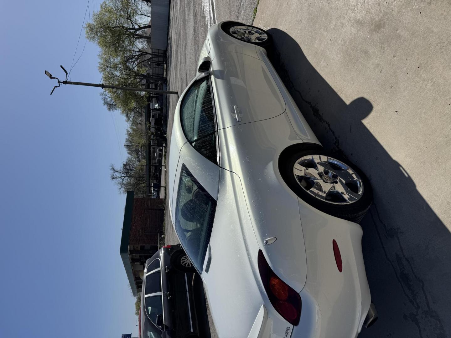 2002 White Lexus SC 430 Convertible (JTHFN48Y620) with an 4.3L V8 DOHC 32V engine, Automatic transmission, located at 3624 Hemphill St., Fort Worth, TX, 76110, (817) 926-8921, 32.696205, -97.331985 - Photo#2